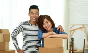 A Canadian son with his mom, moving into the condo she helped him pay for.