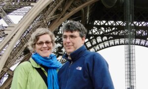 Authors Julie Barlow and Jean-Benoit Nadeau in front of the Eiffel Tower